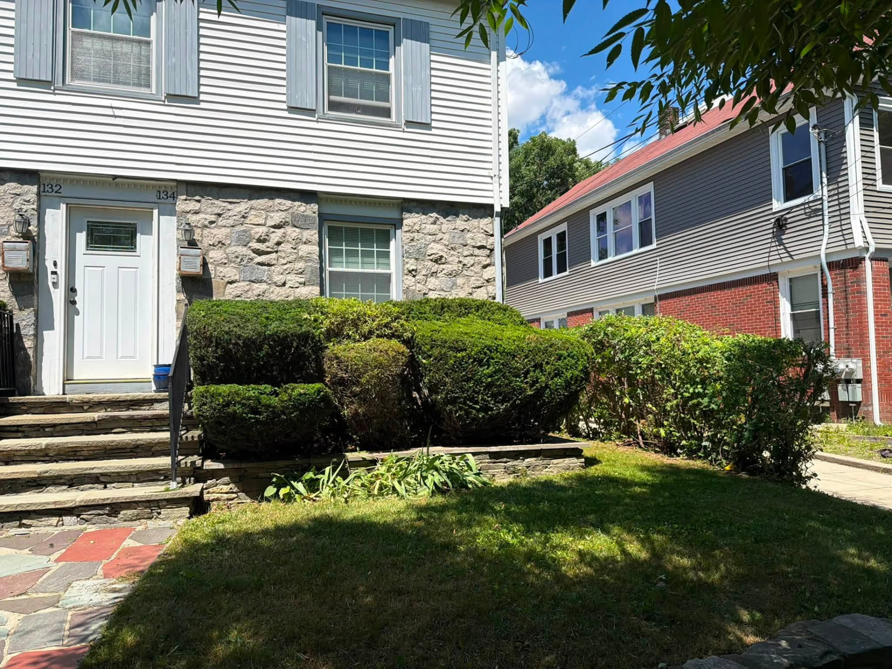 Overgrown Hedges to Clean Lines — after landscaping