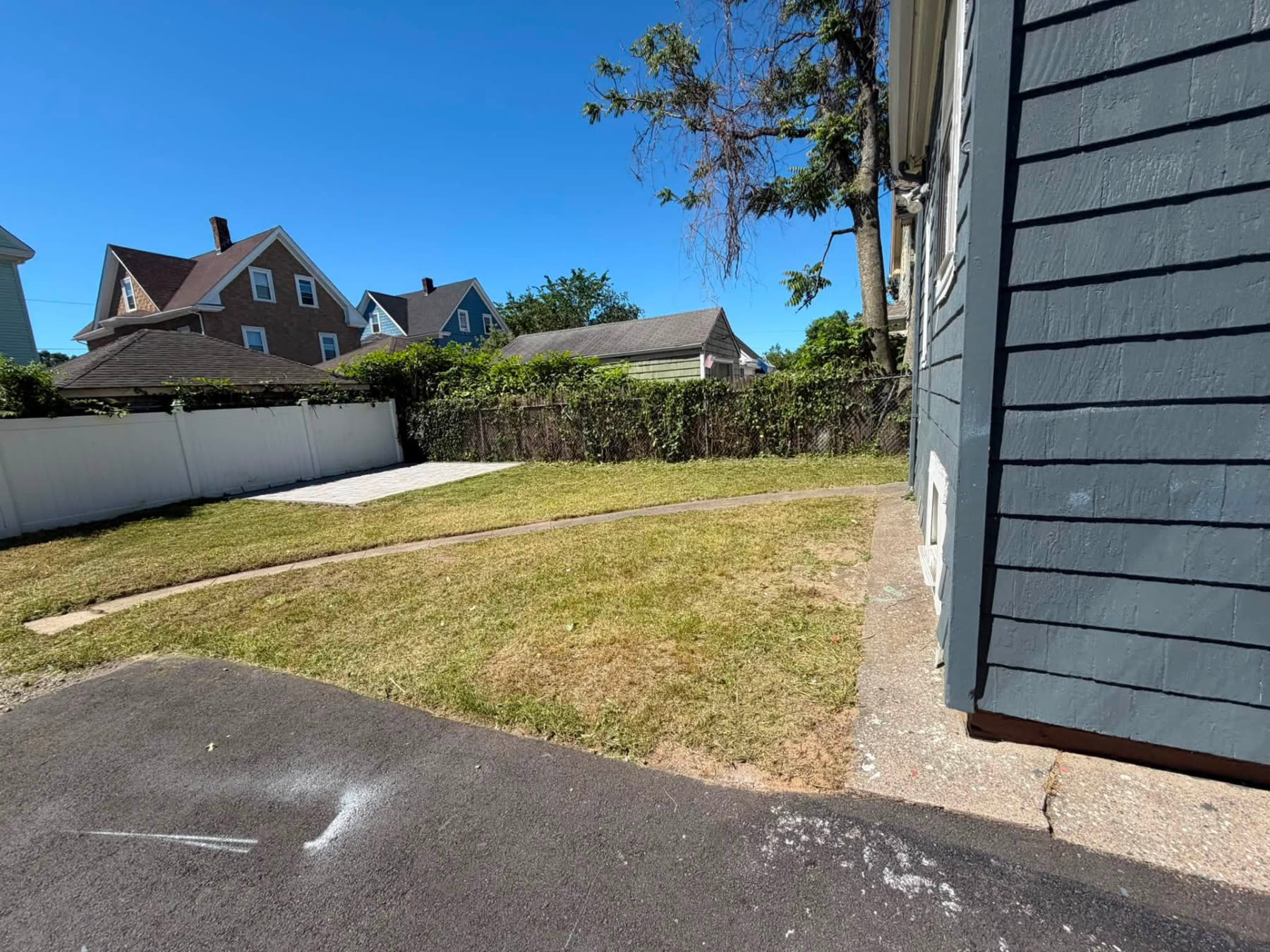 Backyard Mow & Detail — landscaping project in East Providence, RI